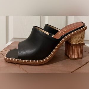 Jessica Simpson Black Leather Mules with Woven Heel
New Without Box